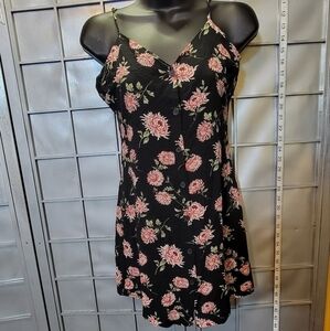 Forever 21 size small top. Adjustable straps. Black with floral.